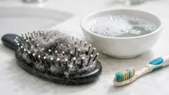 What that gray fuzz in your hairbrush really is (and how to clean it fast)