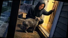 Short story: Something waited on my porch all day—then I heard the door click